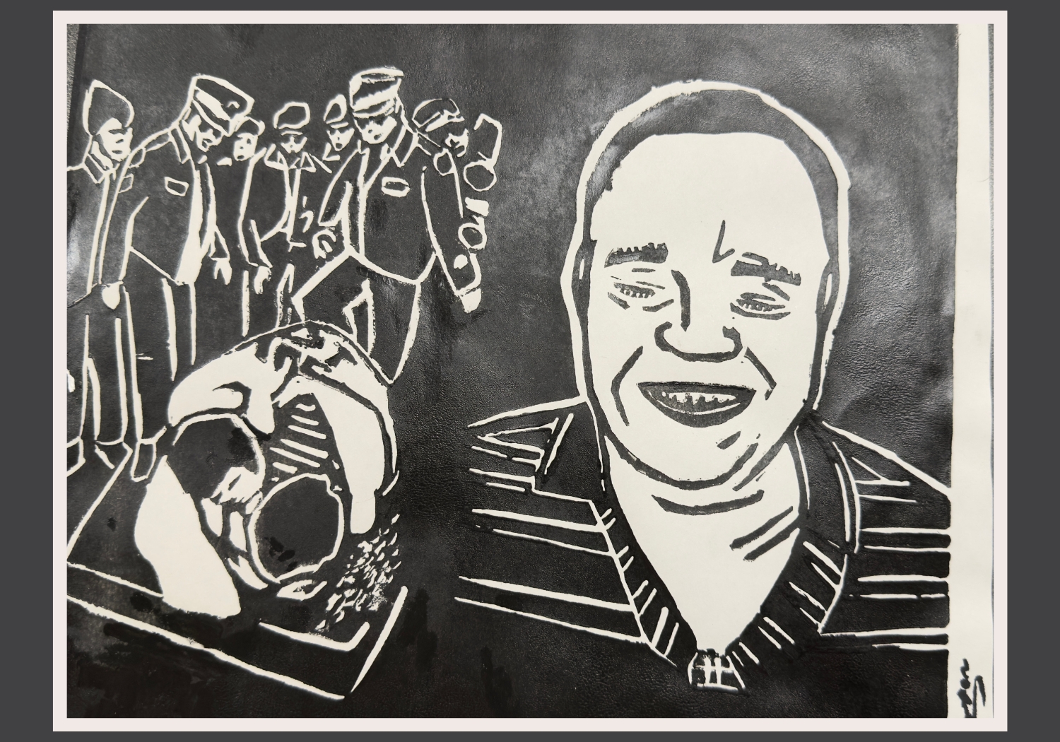 Black and white linocut print. In the foreground is a man wearing a striped polo-shirt. He has a big toothy smile. Behind him a small crowd of people, including two wearing police hats and people with cameras. They are looking down at two people lying together on a mattress in an intimate embrace, wrapped in a blanket.