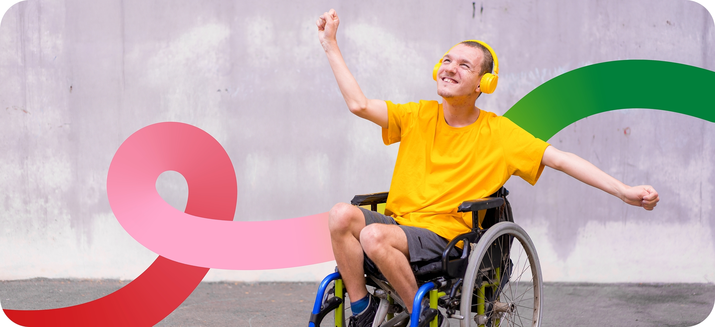 Photo of a person with light skin and short brown hair sits in a grey manual wheelchair. They're wearing a bright-yellow t-shirt, yellow headphones, and grey shorts, with their arms outstretched either side of them. They are smiling towards the sky. Behind them is a grey background, with swirls of reds and green, matching the DRC's logo.